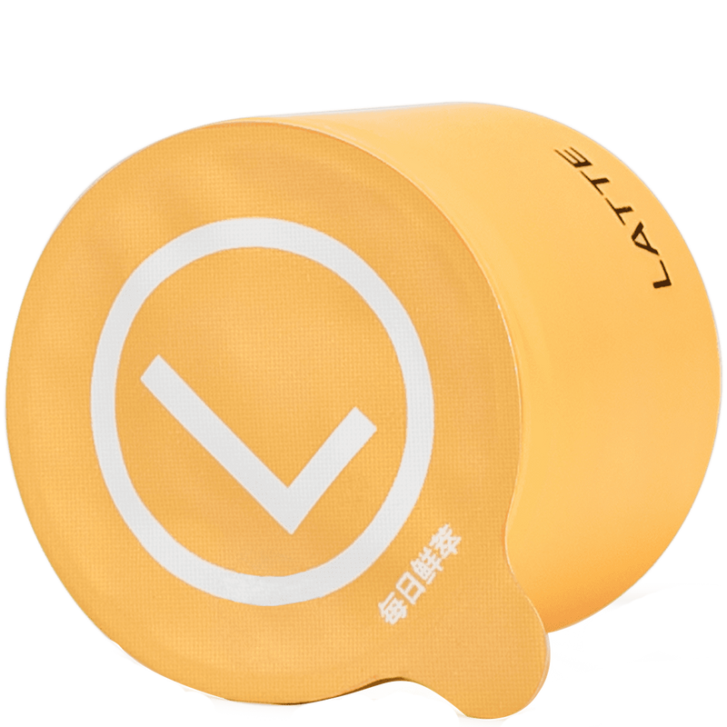 Cubo de café Moins de Colombia de origen único con empaque amarillo ocre